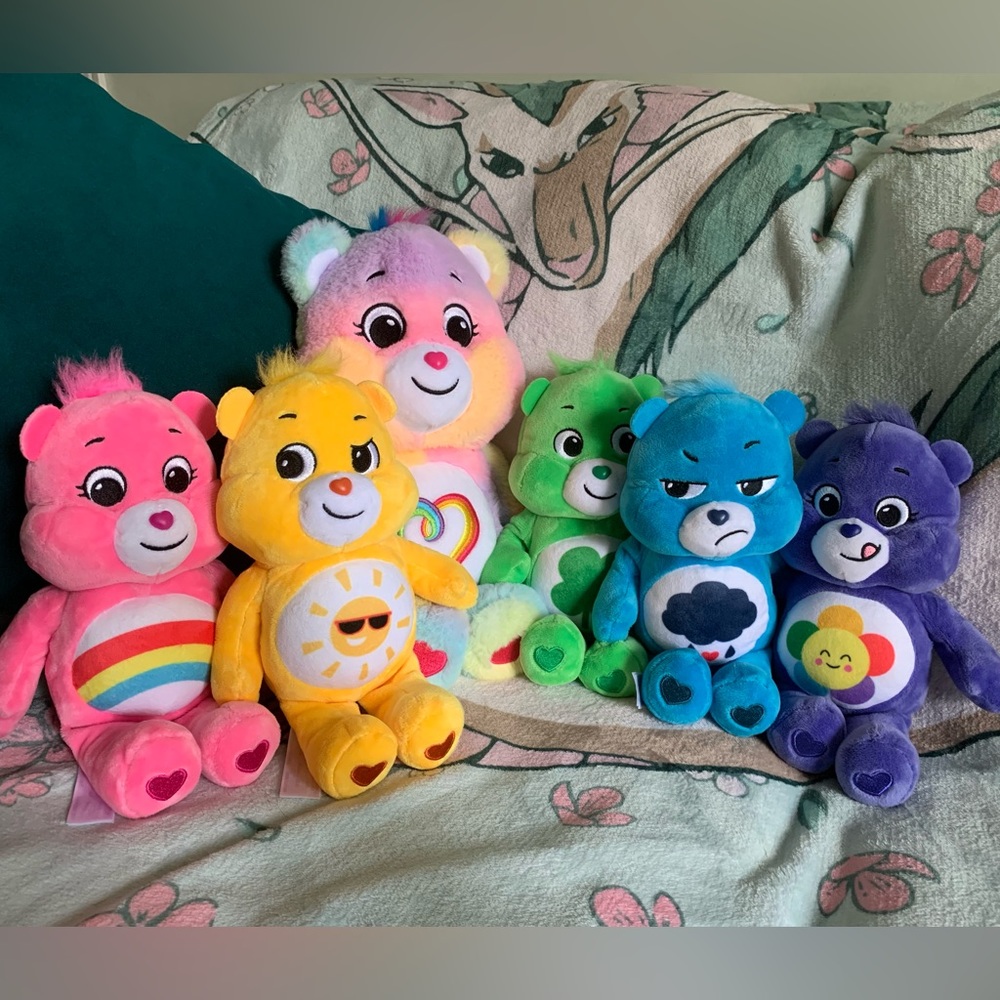 Lot of 6 Care bear plush toys including ToysRUs exclusives